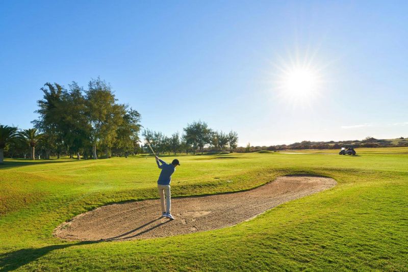 person playing golf in maspalomas